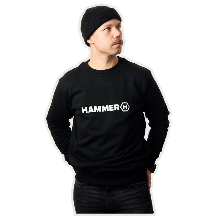 Man with a mustache wearing a HAMMER WEAR sweatshirt